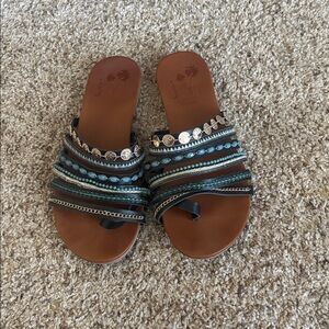 Jellypop Women's Black and Turquoise Sandals